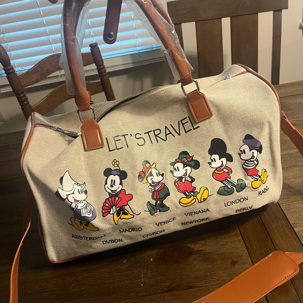Disney Tan and Brown Mickey Mouse Evolution Travel Bag